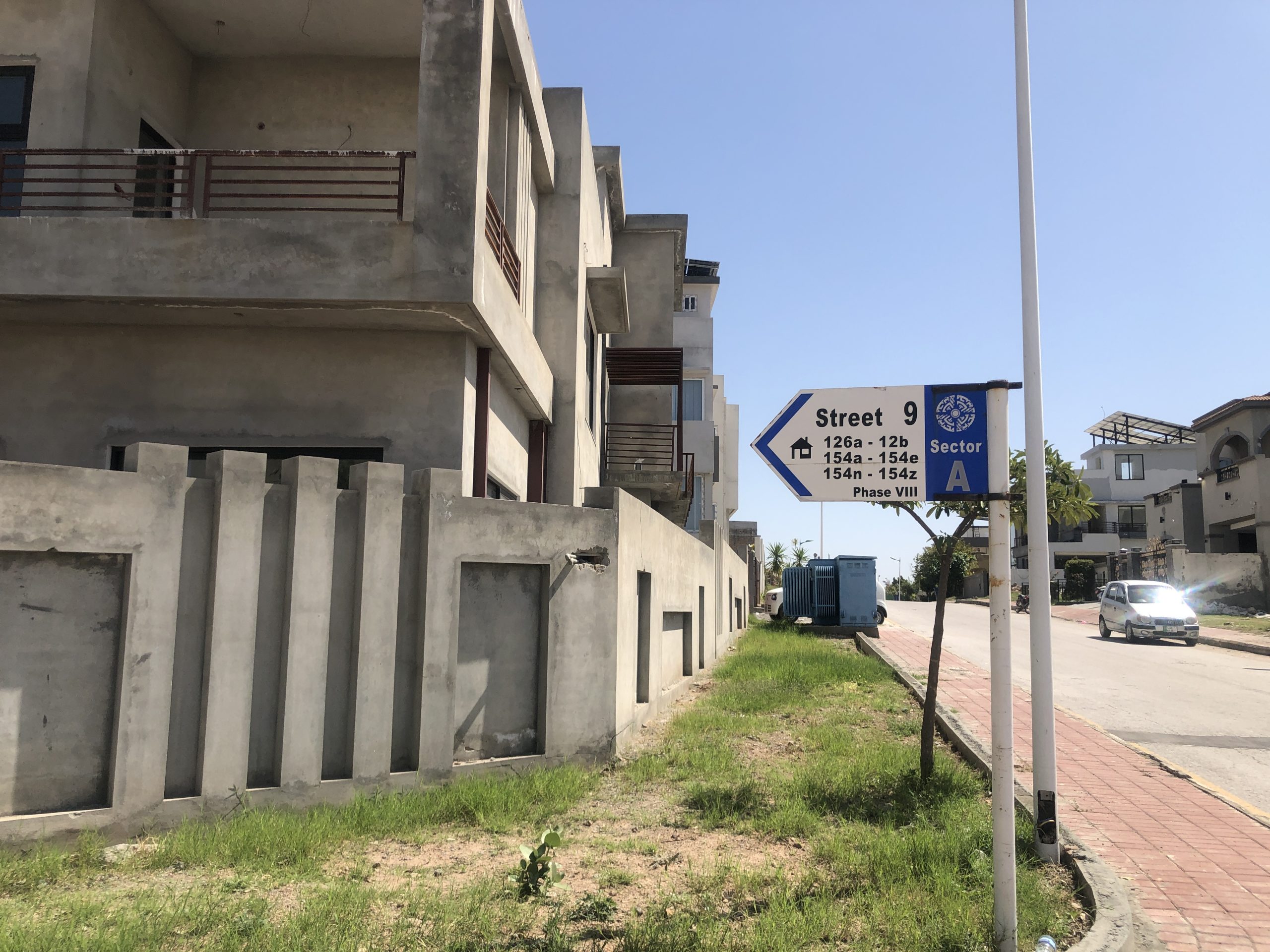 Street 9 sign in Sector A near the 1 kanal plot for sale