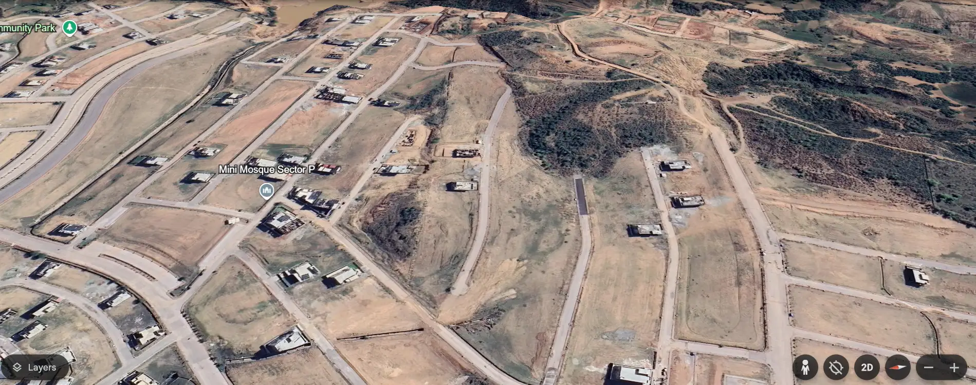 Top-level 1 Kanal Plot 718 in Sector P, Bahria Town Phase 8, showing a flat, rectangular layout with extra land.